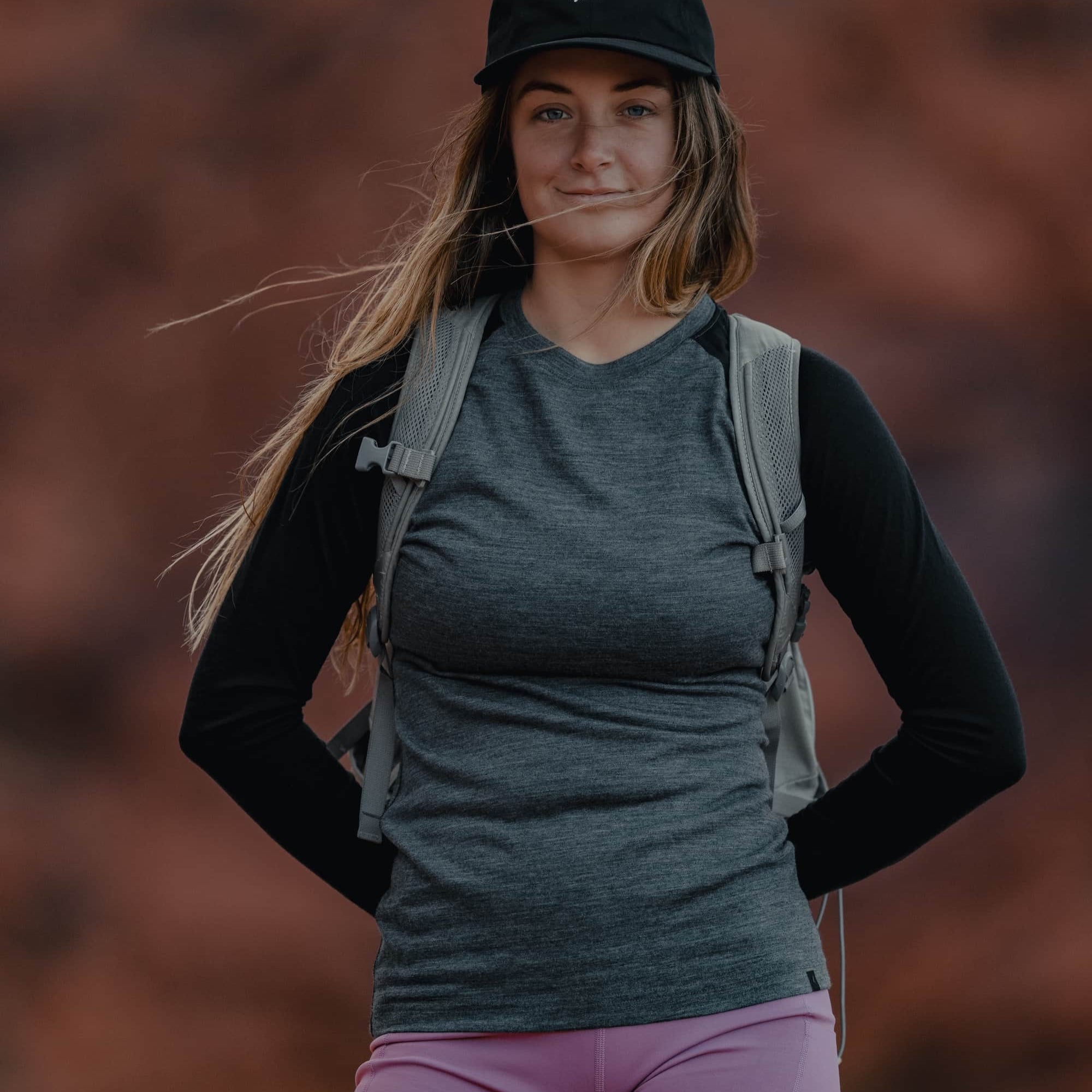 woman wearing an Aspect Base Layer Shirt and Hilltop Shorts