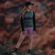 woman wearing an Aspect Base Layer Shirt and Hilltop Shorts