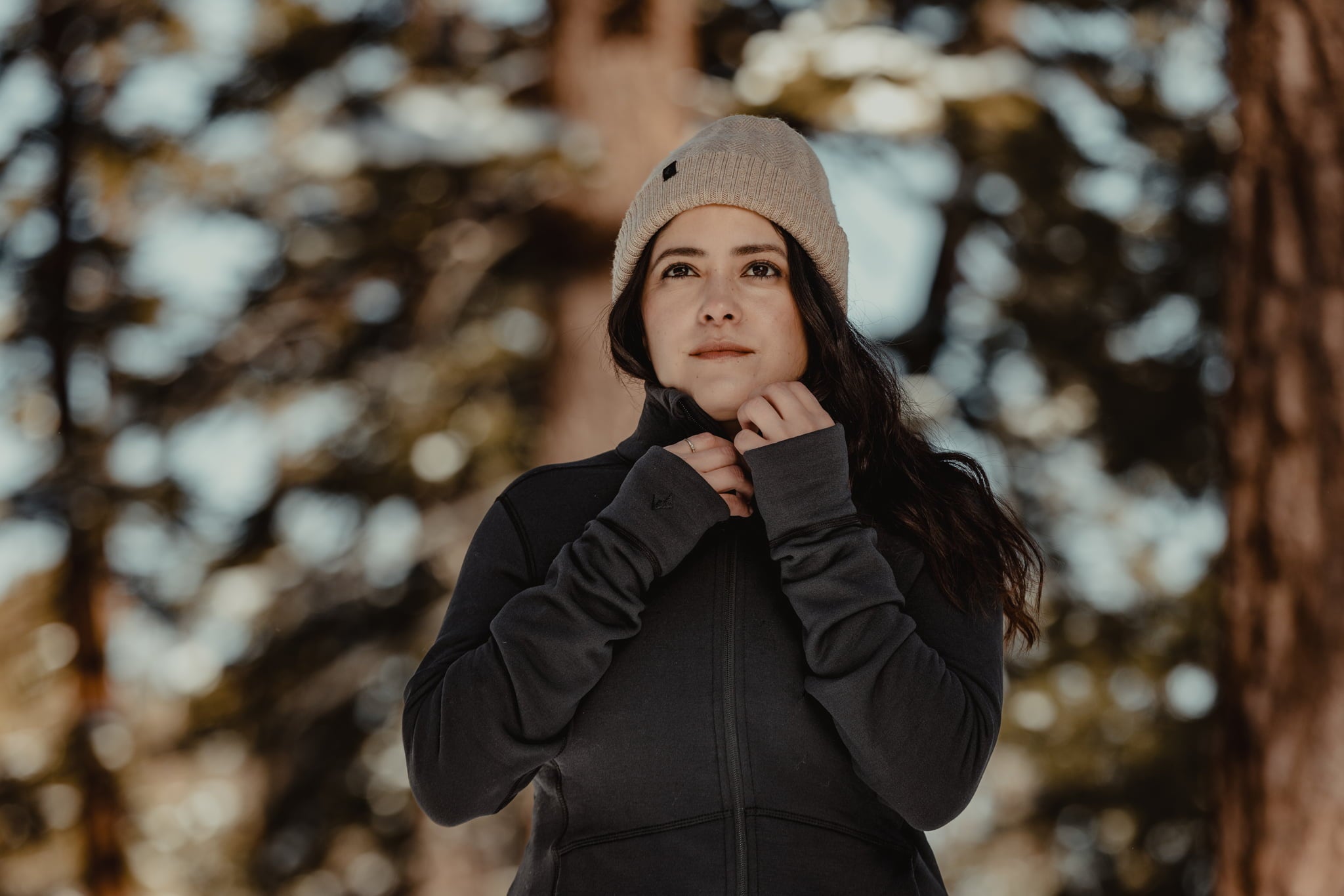 a woman wearing a Ridge beanie and an Ediza Fleece Jacket